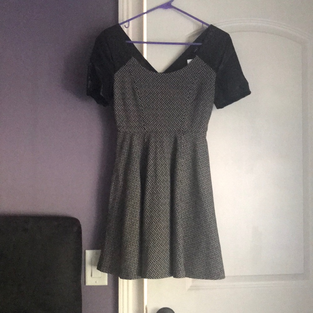 Black leathered sleeve dress